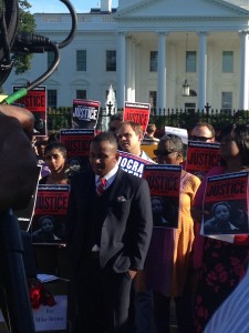 Demonstration with Justice signs in front of WH                      